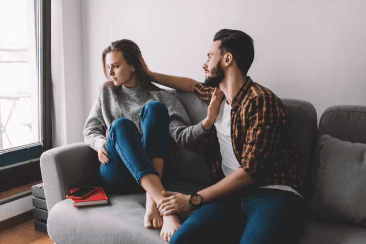 Dissatisfied Woman Pushing Away Boyfriend
