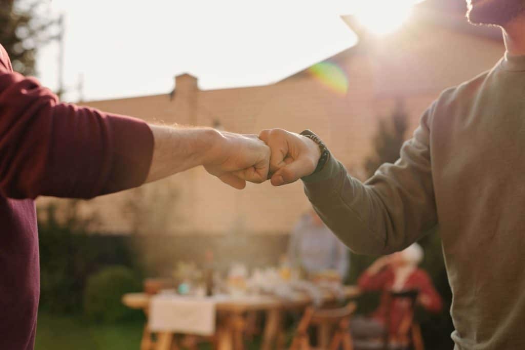 two men pumping fists