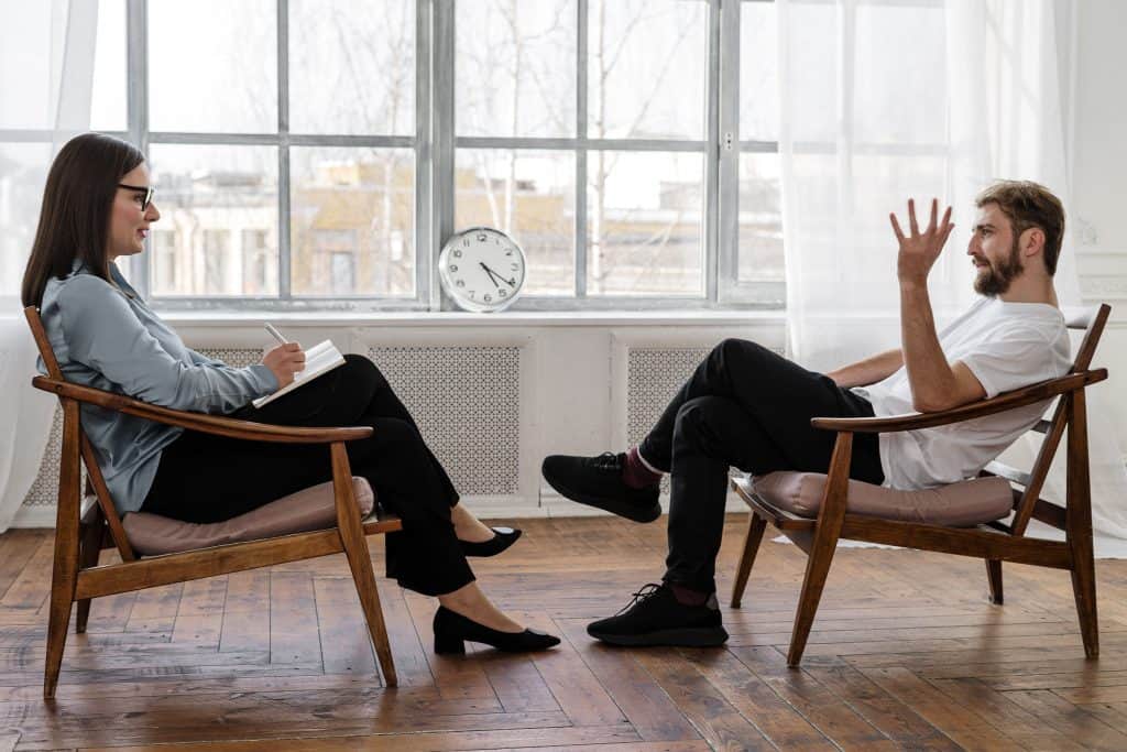 man talking to a life coach