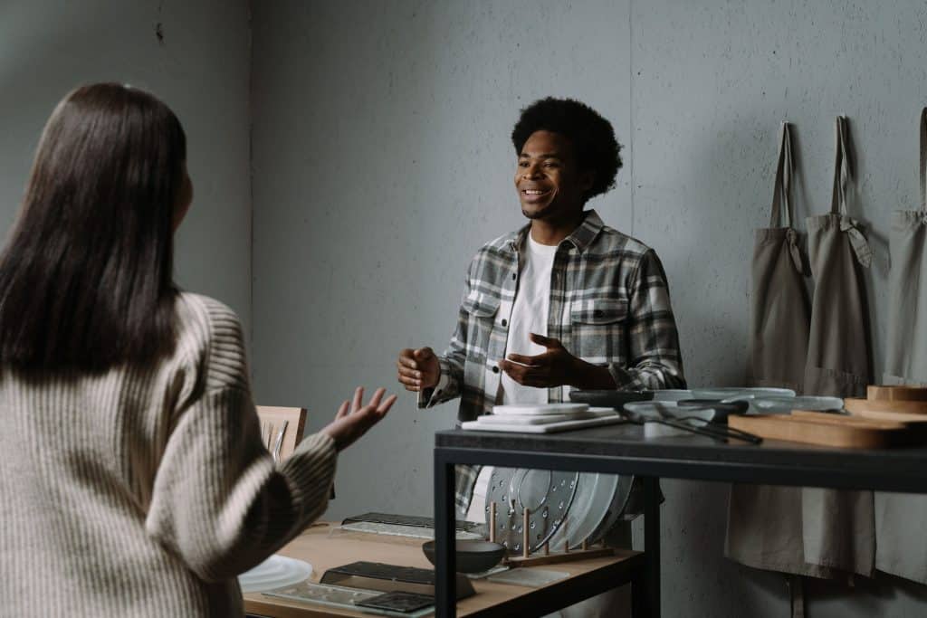man talking to a woman