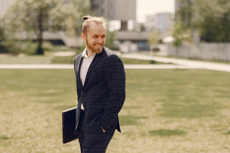 A short man smiling